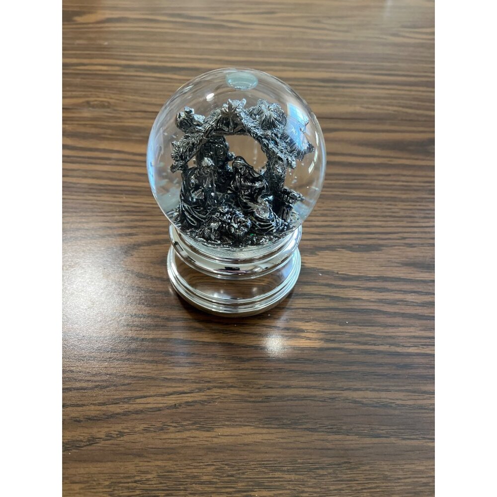 Nativity musical snow globe on silver tone base